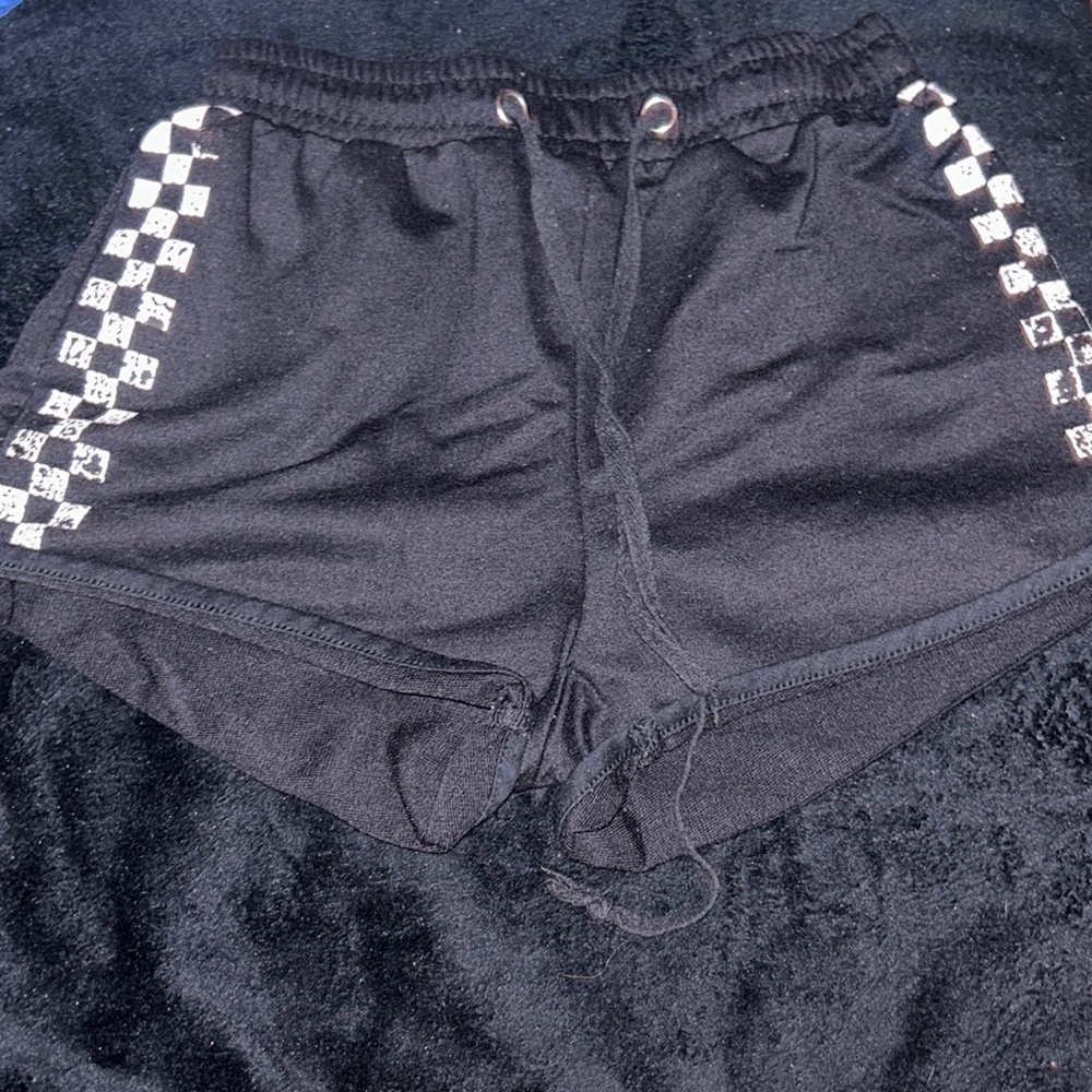 Stella Tweed checkered shorts.